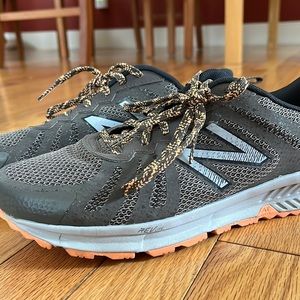 Grey and Orange New Balance running shoe 7.5